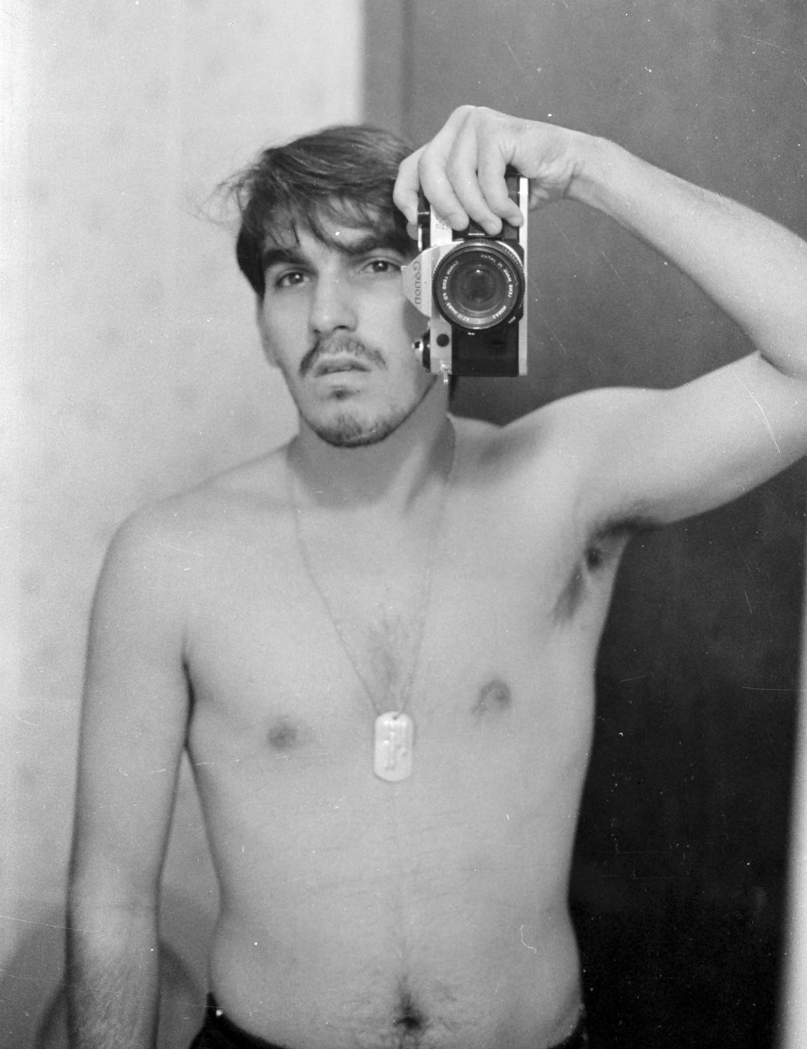 Marcelo Kertész photographing himself in a mirror